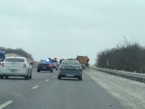 Escort of 3 salt trucks and a policeman...blocking all lanes. #dadmad